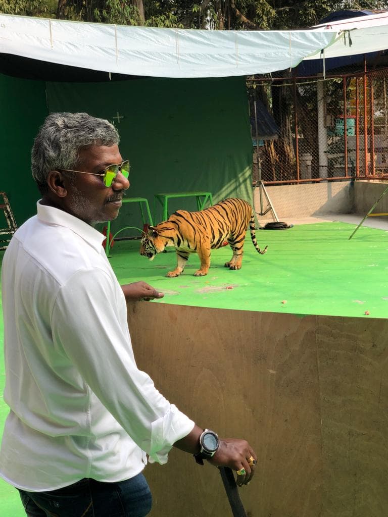 Beach location filming in Thailand with production crew